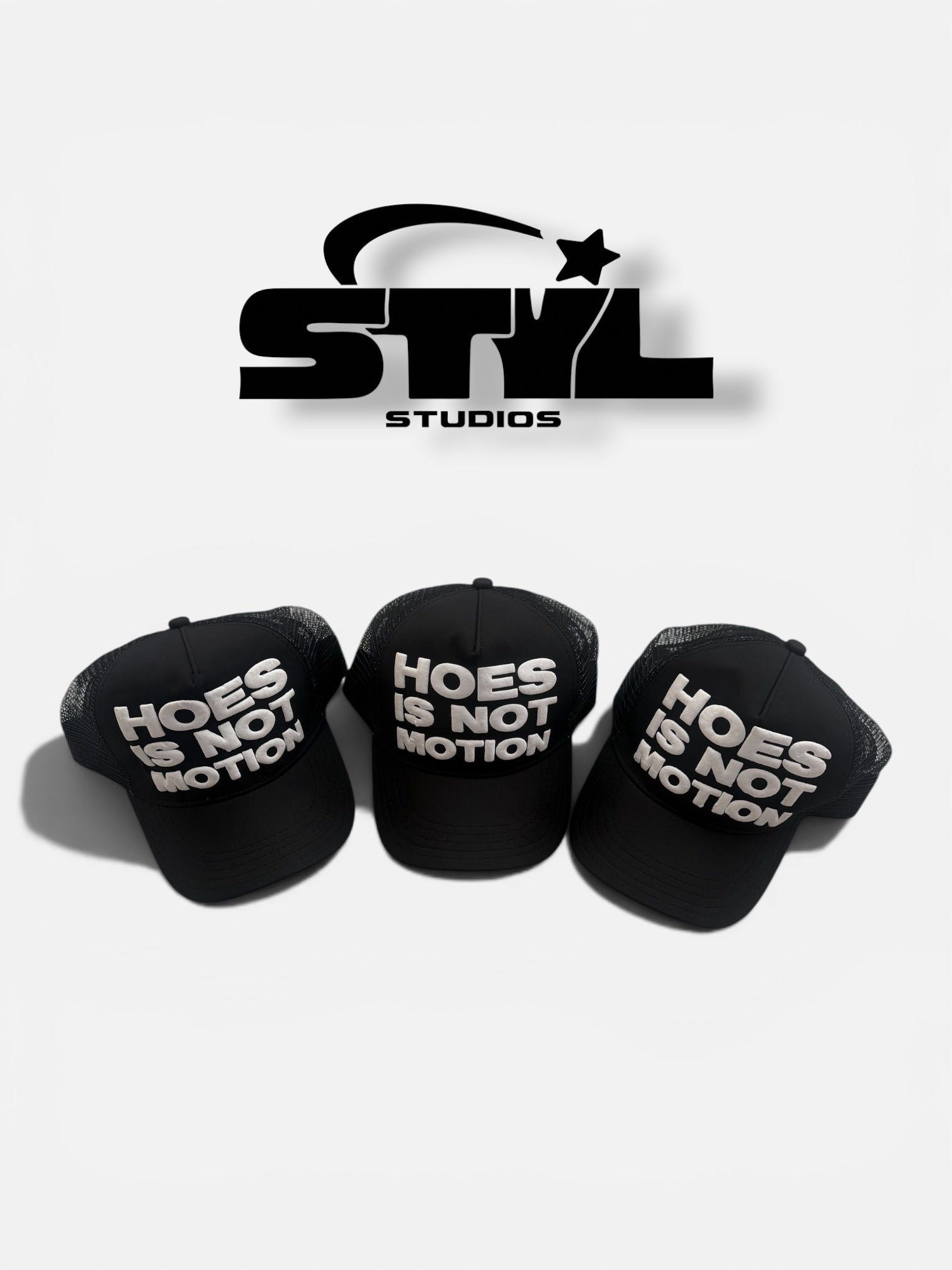 STYL Studios “Hoes Is Not Motion” Trucker Hat