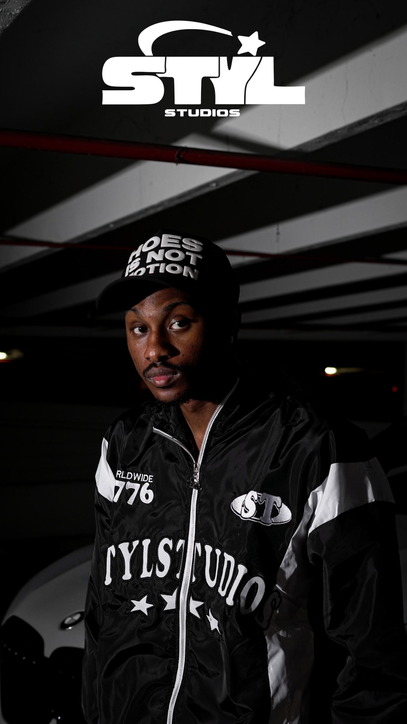 STYL Studios “Hoes Is Not Motion” Trucker Hat