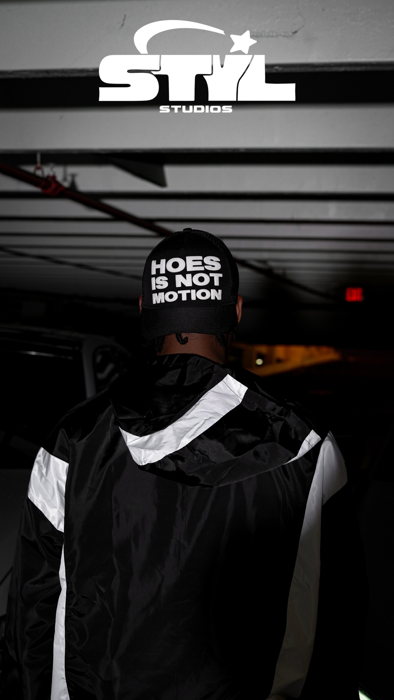 STYL Studios “Hoes Is Not Motion” Trucker Hat